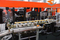 ऑरेंज 4 गुहा प्लास्टिक स्वचालित पीईटी बोतल उड़ाने वाली मशीन 9 किलो / सेमी 2