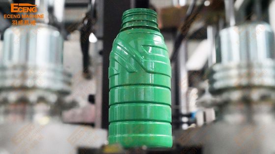 ऑरेंज 4 गुहा प्लास्टिक स्वचालित पीईटी बोतल उड़ाने वाली मशीन 9 किलो / सेमी 2